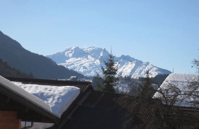 Garden level with south-facing terrace and view of the Aravis massif
