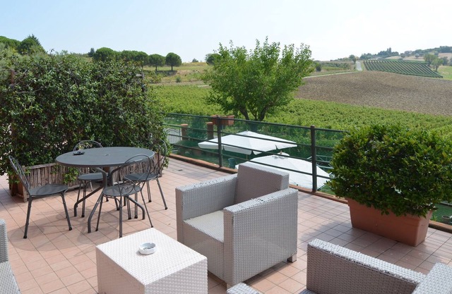 Garden-View Apartment in Coriano Italy with Swimming Pool