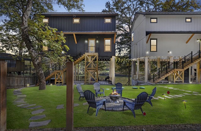 Gather, relax, and explore the river. Two side-by-side homes with space for 22 guests, hot tub under the stars, arcade fun, and peaceful water views.