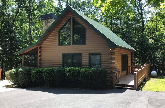 Get away from it all in this cozy cabin nestled in the woods.