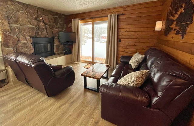 Get away from it all with modern conveniences! Pet friendly with hot tub!