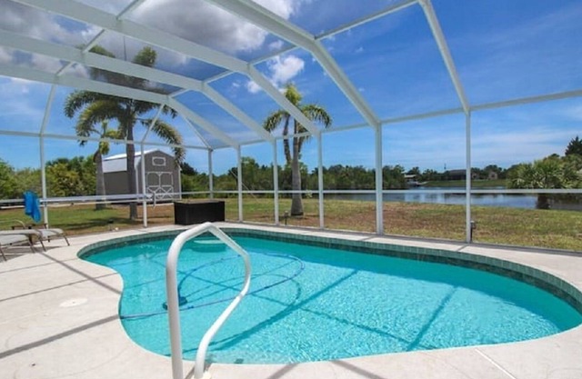 Gorgeous 3 BR / 2 BA home with heated pool on the canal. Sleeps 6