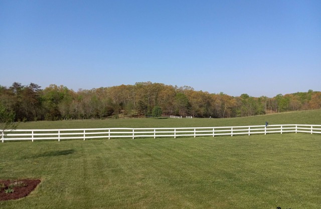 Gorgeous countryside farmhouse on 10 acres. Carriage house also available.