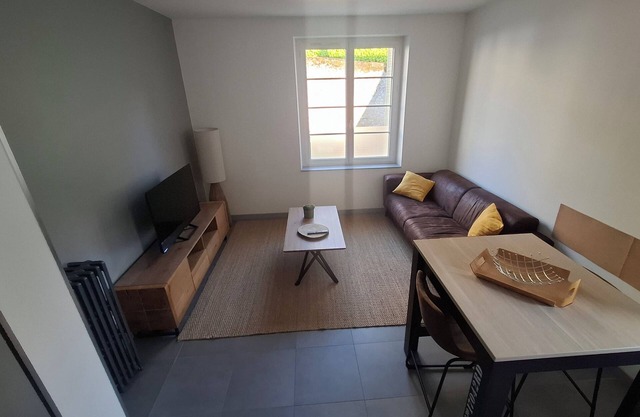 Ground floor apartment with courtyard. A town house with two apartments.