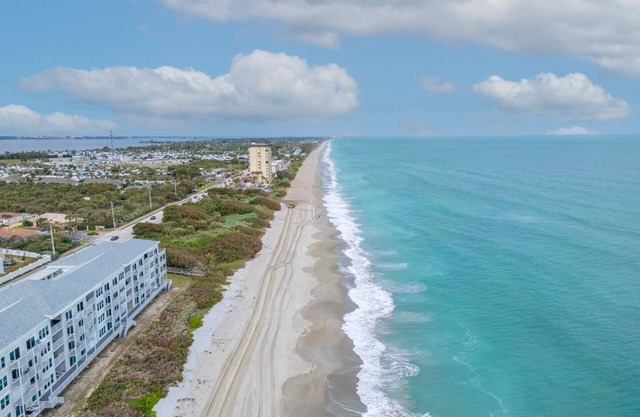 Harbor Island beach house with private and public pools.