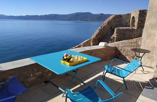 Historical house in a thousand years old citadel above the sea
