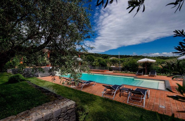 Holiday apartment with garden and outdoor swimming pool