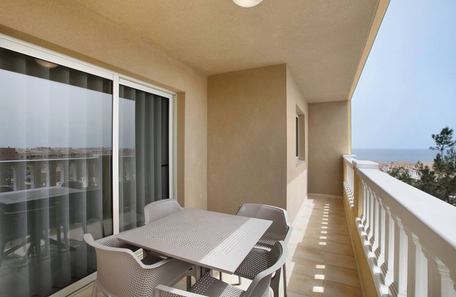 Holiday Apartment 'La Perla E35 By Médano Rentals' with Shared Pool, Balcony and Wi-Fi