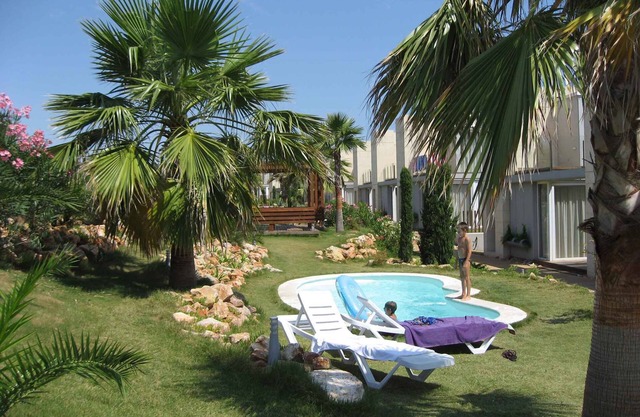 Holiday apartment with beautiful garden and various pools