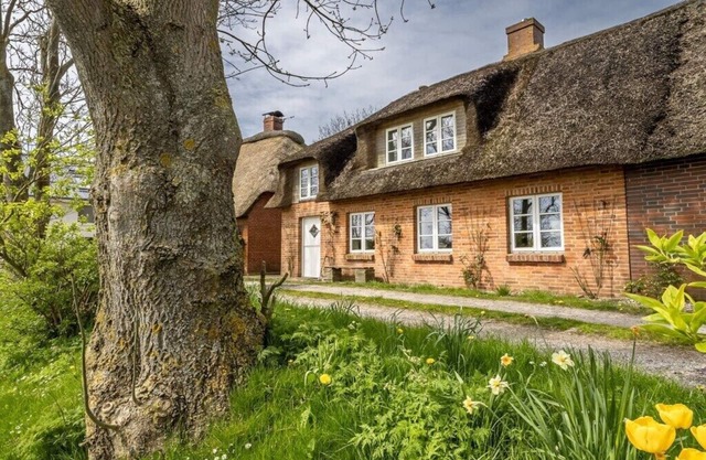 Holiday home in Pellworm with swimming pool