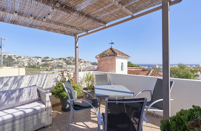 Holiday Home 'La Casa Armoniosa' with Sea View, Wi-Fi and Air Conditioning