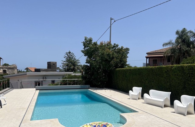 Holiday home "Tropical House" with private pool and near the sea