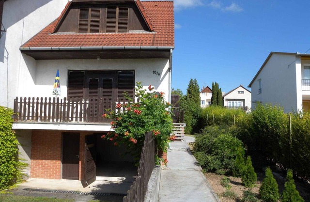 Holiday home with balcony and garden furniture