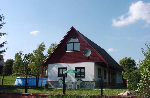 Holiday home with outdoor swimming pool