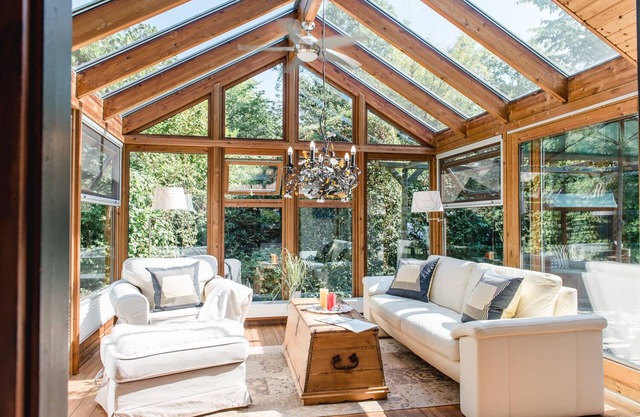 Holiday house with sea view and sauna, fireplace & winter garden located directly on the forest