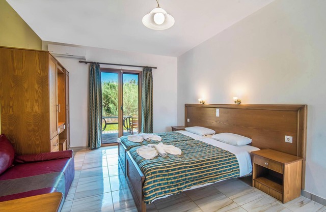 Holiday Studio 'Mirage Arillas Studio Type C16' next to Beach with Balcony, Shared Pool & Wi-Fi