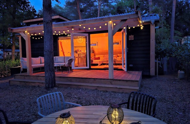 Home of Wood, tiny house in wooded area