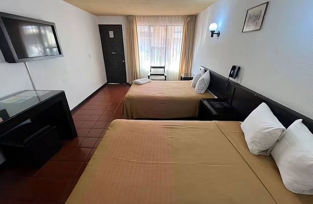 Hotel Villa Capri, 2 camas dobles 4 Huéspedes