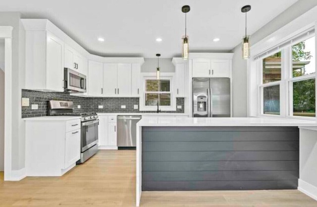 House with garage, outdoor dining and basement bar