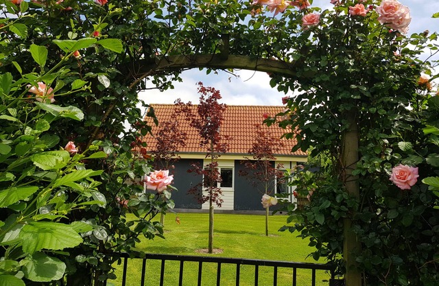Idyllic summerhouse behind beautiful authentic haubarg