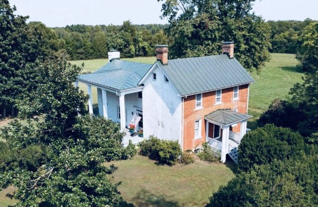 Immaculate 1902 Farmhouse on 10 private acres.