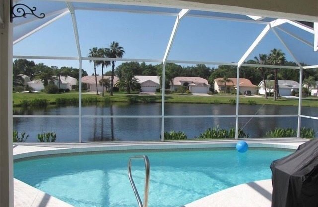 Immaculate, quiet, pet and family-friendly pool home backing on pond