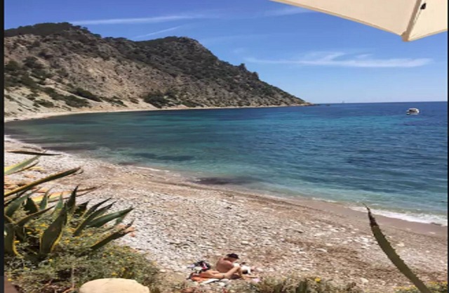 Immersed in the greenery of the Ibiza golf club,with private beach,swimming pool