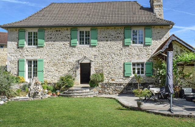 In the midst of beautiful nature welcomes you this gorgeous farmhouse with beautiful garden.