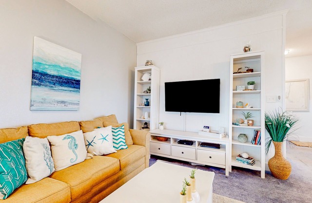 Incredible waterfront condo with amazing ocean views, pool, deck, & beach access