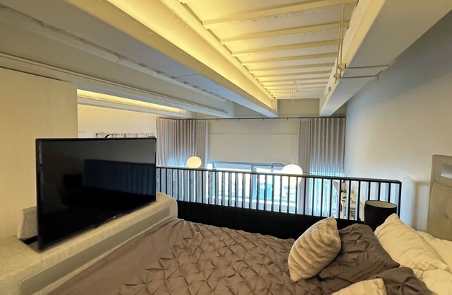 Industrial-Chic 1BD Loft by the River — Fulham!