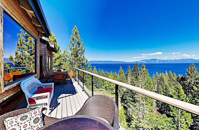 Just above the waters of Meeks Bay, this remarkable home offers unobstructed 180-degree lake views.