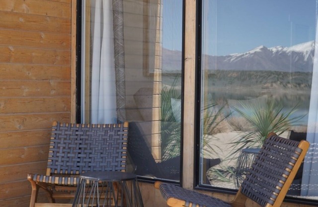 King Bed-Firepit-Shade-Chairs-Dark Skies