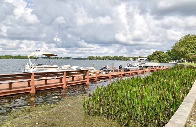 ☀️ King Condo w/Sunroom, Lakeside Pool and Waterfront Park