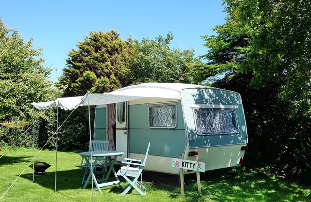KItty unique 60s caravan set in pretty garden