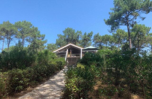 La Jenny Chalet with views of communal pool in Naturist Village