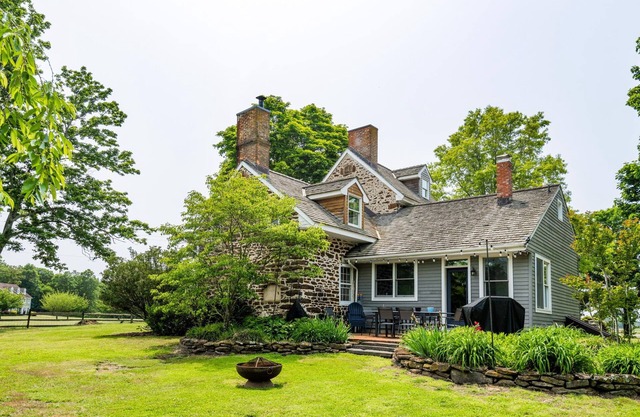 Lake front historic farmhouse on 5 acres, fenced and pet friendly!