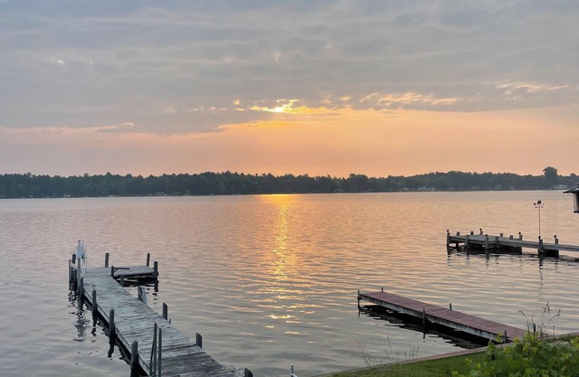 Lake house paradise w/boat dock, fire pit, and close to trailhead