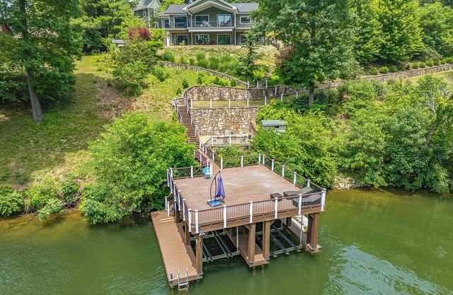 Lakefront home on Claytor Lake with private dock, scenic decks, stylish interiors, and cozy bedrooms