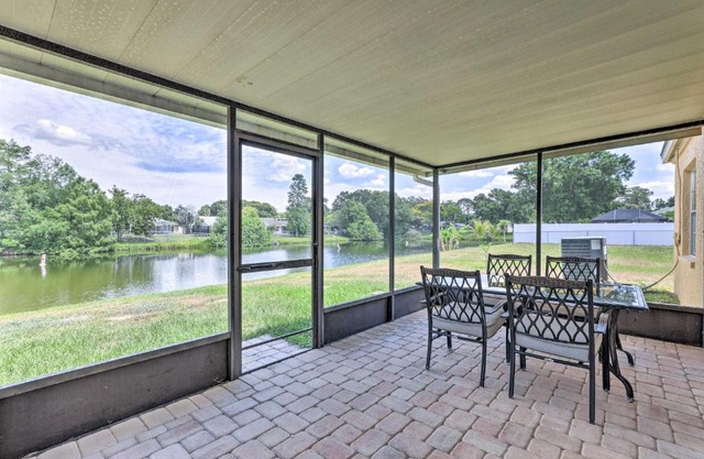 Lanai and Pond at Tranquil Bradenton Retreat!