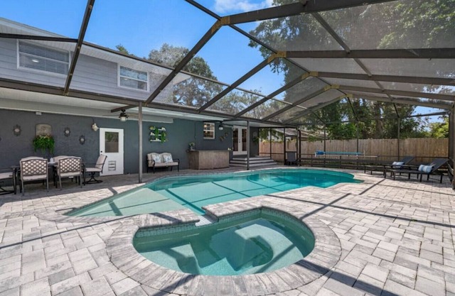 Large 2 story home with pool mins from the beach