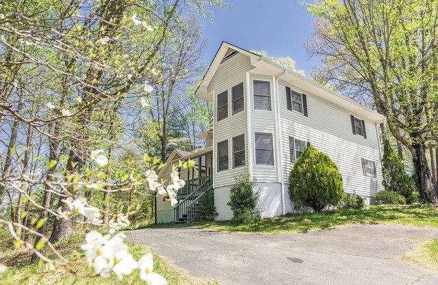 Large 5-bedroom mountain home with a game room and hot tub, close to everything!