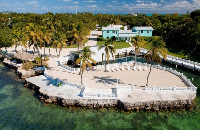 Large bay-front home with dockage, pool and beach in the heart of Islamorada