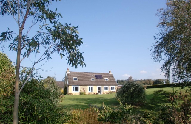 Large house on a working farm