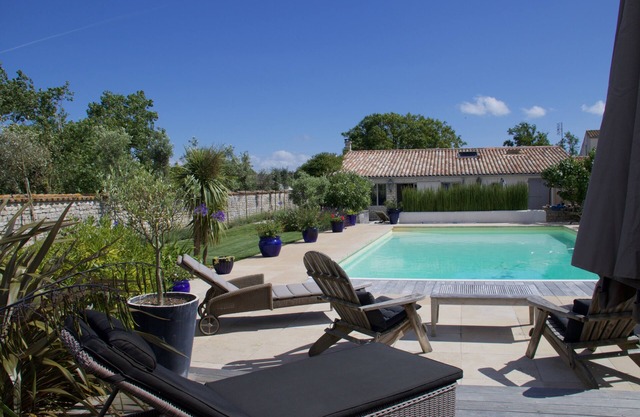 Large Property with 2 Villas separated by a large heated swimming pool