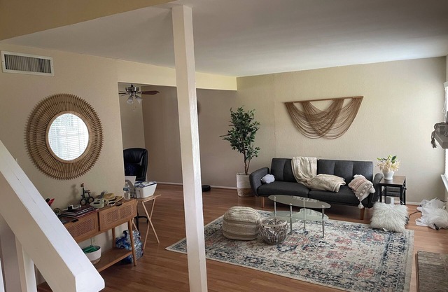 Large room with attached bathroom in the energy corridor area