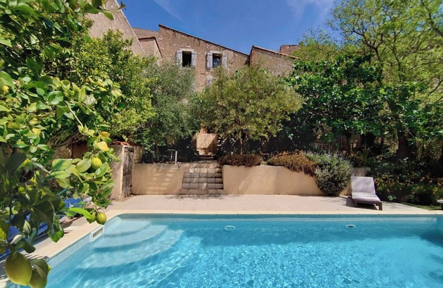 Large vacation home in Tautavel with wooded garden and private pool.