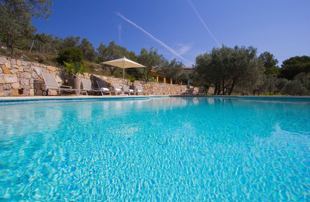 Large Villa with heated pool and stunning views set among olive trees