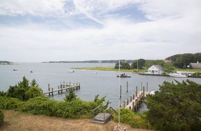Large waterfront home with deep water dock, you'll Fall in love with Breezy Bluff
