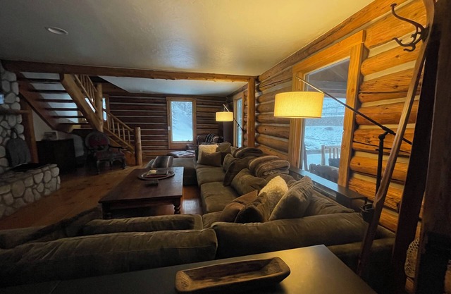 Lena's Cabin in Vail is nestled right beside Gore Creek, minutes from skiing.
