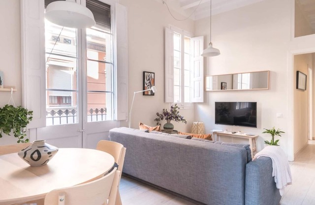 Light, cozy terrace and local life in Gracia